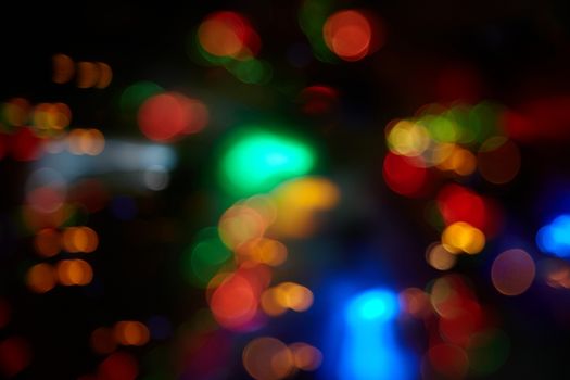 Abstract background with colorful spheres of defocused illumination