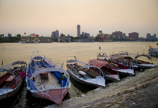 nile river with boats at sunset in cairo egypt
