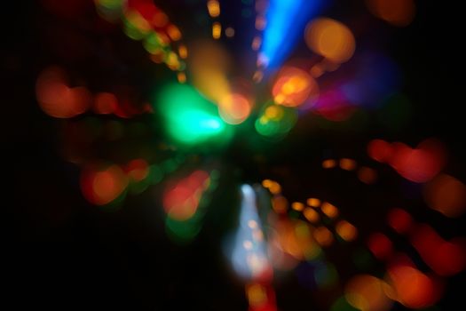Abstract background with colorful spheres of defocused illumination