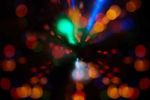 Abstract background with colorful spheres of defocused illumination