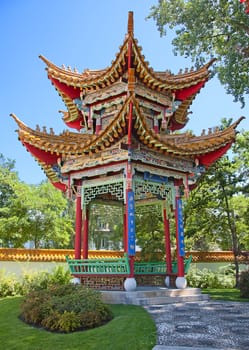 Traditional chinese garden with pavilon of harmony