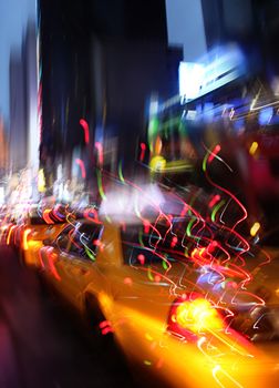Illumination and night lights of New York City. Intentional motion blur