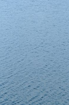 blue water surface on the wind