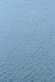 blue water surface on the wind