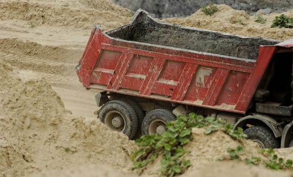 huge truck on a coal mine open pit