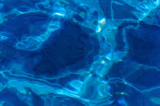 blue abstract background of wavy water surface