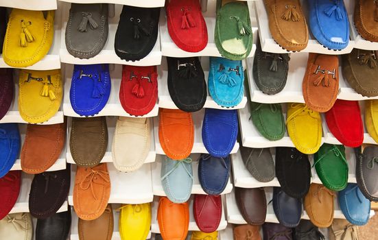 variety of the colorful leather shoes in the shop 