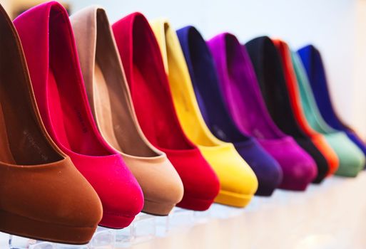 variety of the colorful leather shoes in the shop 