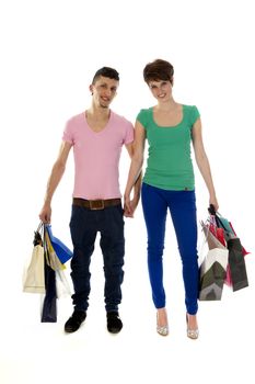 a couple with shopping bags on a white background