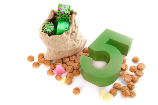 A jute bag with gingernuts, for celebrating the dutch holiday " sinterklaas " on the fifth of December