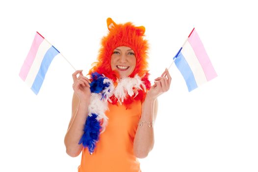 a girl, dressed in orange as a supporter of the dutch soccerteam.