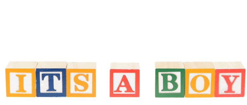 Letter blocks spelling its a boy. Isolated on a white background.