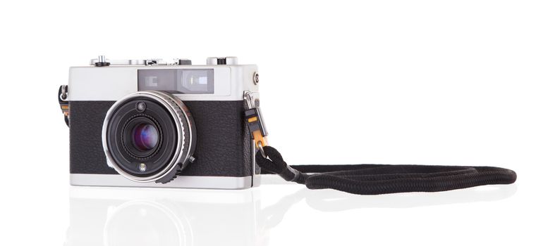 Old vintage camera isolated on white background