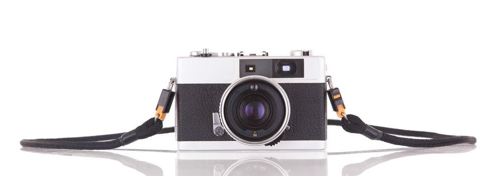 Old vintage camera isolated on white background