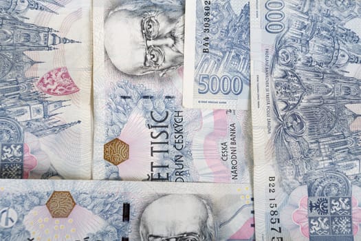 czech banknotes nominal value five thousand crowns as background