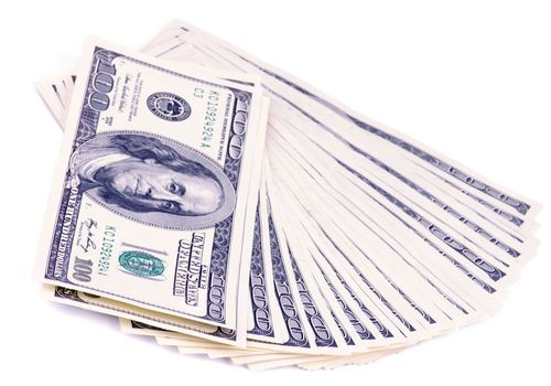 Arrangement of 100 Dollar Banknotes isolated on white background