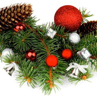 Christmas Decoration. Heap of Spruce Branch, Red Baubles, Silver Gift Boxes and Fir Cones isolated on white background