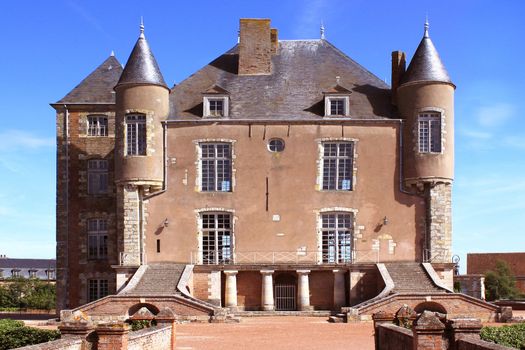 In front of Castle of Bellegarde with its staircases and its turrets