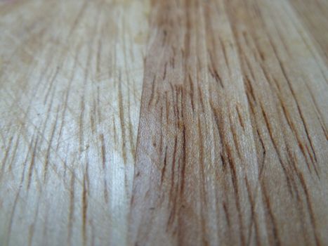 Wood grain surface with knife marks as a background