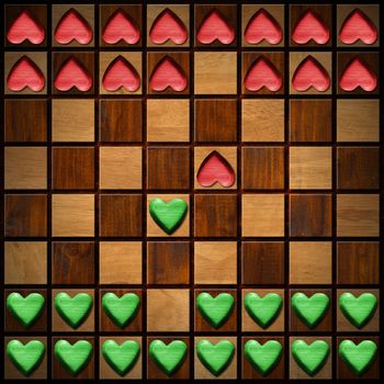 Wooden chessboard with wooden green and red hearts, love concept