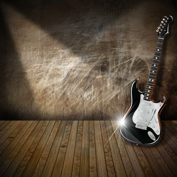 Black and white electric guitar in a old abandoned interior