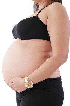 Image of pregnant woman touching her belly with hands