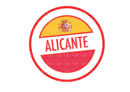 Passport-style ALICANTE rubber stamp over a white background.