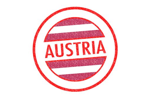 Passport-style AUSTRIA rubber stamp over a white background.