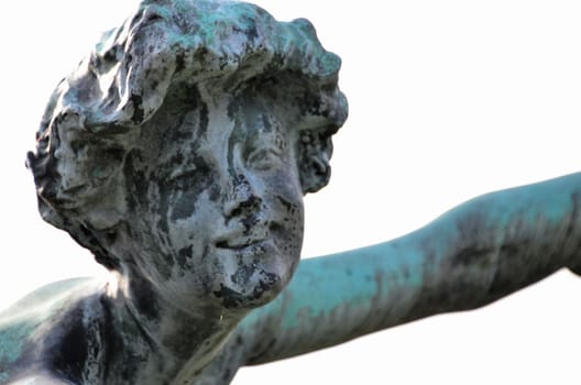 The head of a sculpture in a park in Antwerp.