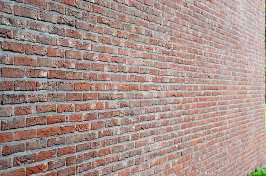 A brick wall of a construction.