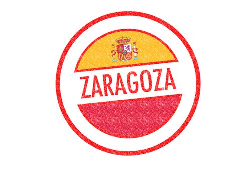 Passport-style ZARAGOZA rubber stamp over a white background.