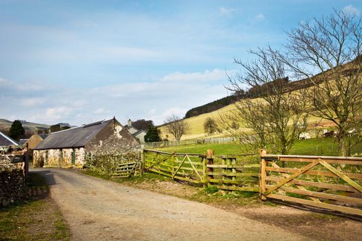 Old stone farm buildings in Yetholm, Scotland