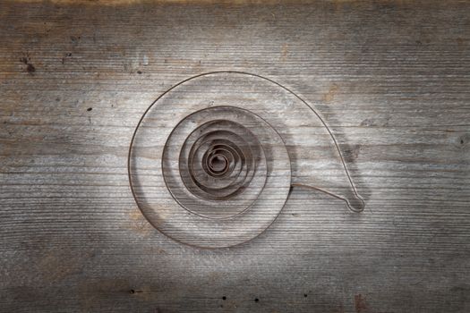 clock spring on oldwooden background