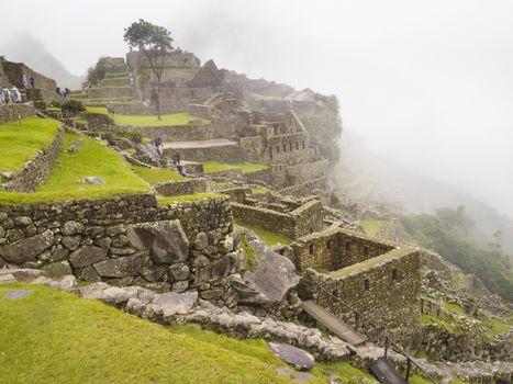 The ruins site of a pre-Columbian 15th-century Inca site of Machu Picchu after rain in Machupicchu District, Urubamba Province, Cusco Region, Peru.