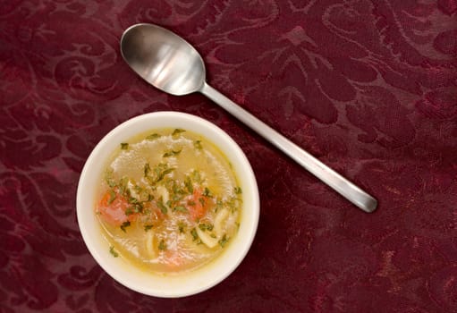 vegetable soup on decorative table cloth