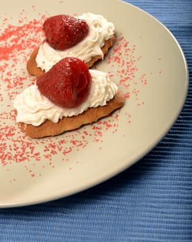 strawberry cookies on a plate