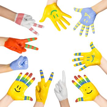 painted children's hands in different colors with smilies