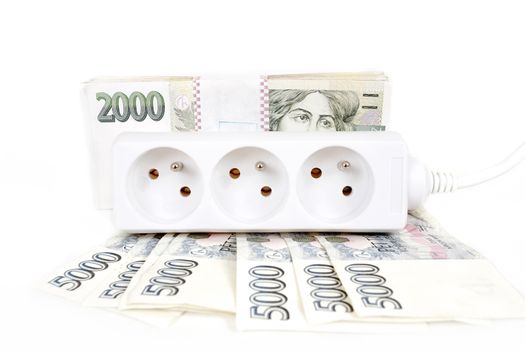 power cord and banknotes of czech crowns money concept of expensive energy bill