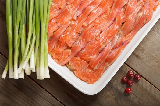 A dish with Swedish fish meal - gravlax, prepared for baking