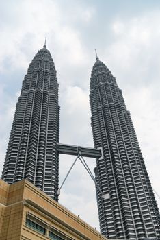 KUALA LUMPUR - JUN 15: Petronas Towers on Jun 15, 2013 in Kuala Lumpur, Malaysia. The towers were the tallest buildings in the world from 1998 to 2004  (451.9 m). 