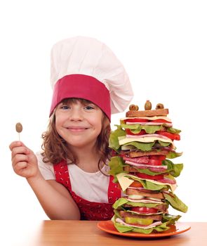 happy little girl with olive and tall sandwich