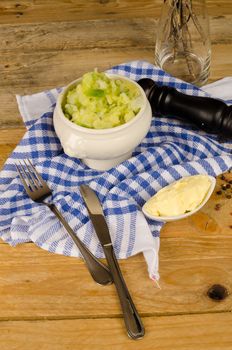 Traditional Irish Halloween food, Colcannon in a still life on a rustic table