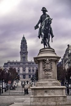 Oporto, December 2012. King Pedro IV monument and cityhall on background. Celestin Anatole Calmels 1862 - 1866. Oporto downtown, UNESCO World Heritage Site.