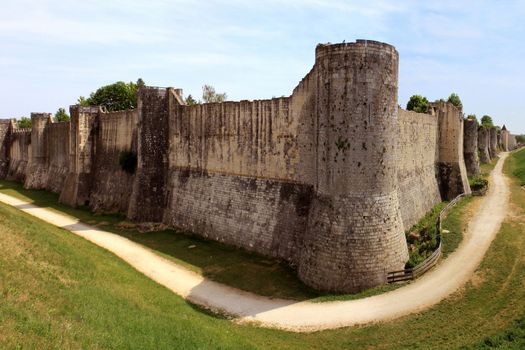 ramparts or fortifications and moat of a castle from medieval times