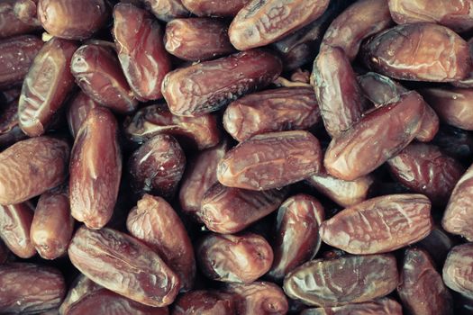 Selection of fresh Tunisian dates as a background