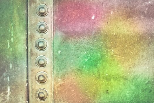 Vibrant colours on a grungy metal background