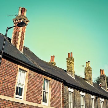 Terraced victorian houses in england in vintage tones