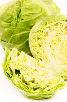 Heap of Fresh Raw Cabbage Full Body and Halves closeup on white background