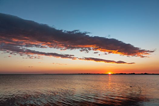 Beautiful sunset over water in Aveiro, Portugal