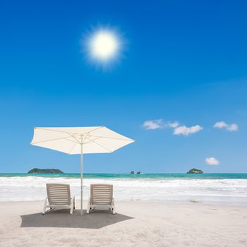 Two chairs and umbrella at the beach. Manuel Antonio, Costa Rica.